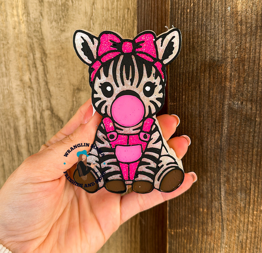 Zebra blowing bubble